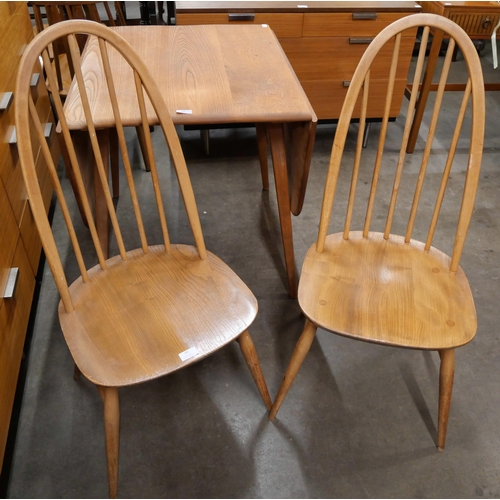 64 - A pair of Ercol elm and beech Quaker chairs