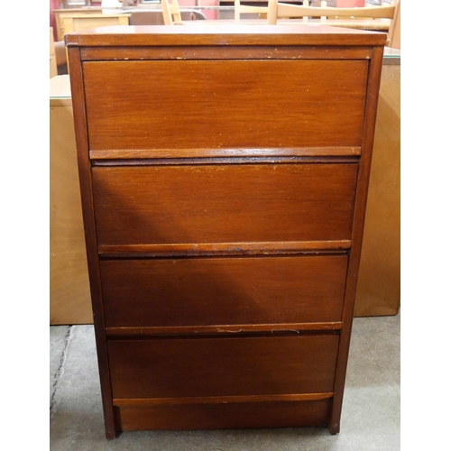 73 - A teak bedside chest of drawers