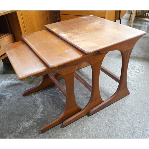 86 - A teak nest of tables