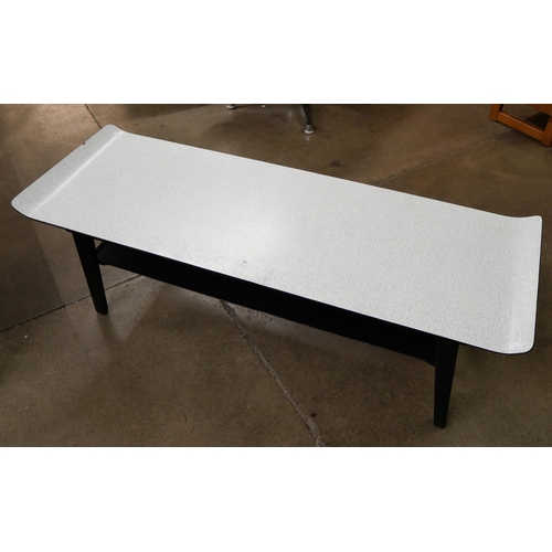 88 - A Formica topped coffee table