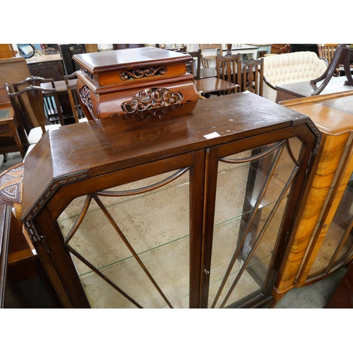 92 - A mahogany two door display cabinet