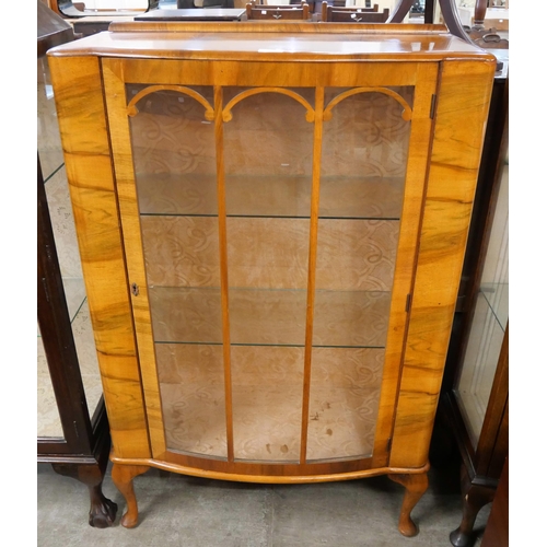 93 - A walnut single door display cabinet