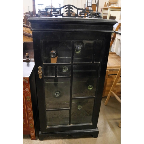 97 - A Victorian Aesthetic Movement ebonised single door display cabinet