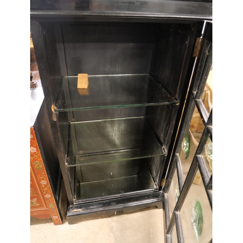 97 - A Victorian Aesthetic Movement ebonised single door display cabinet