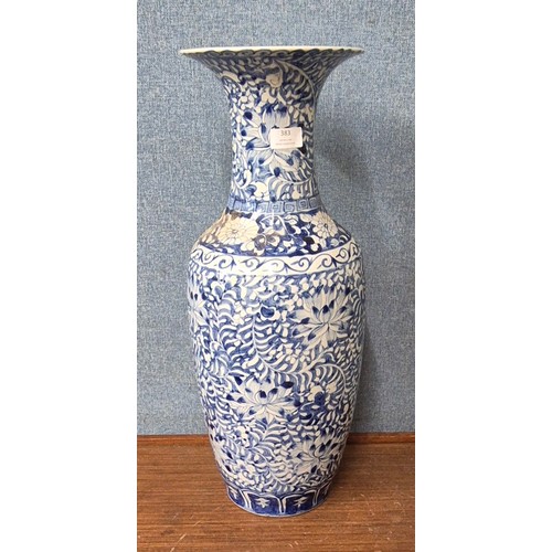 383 - An Oriental blue and white porcelain vase