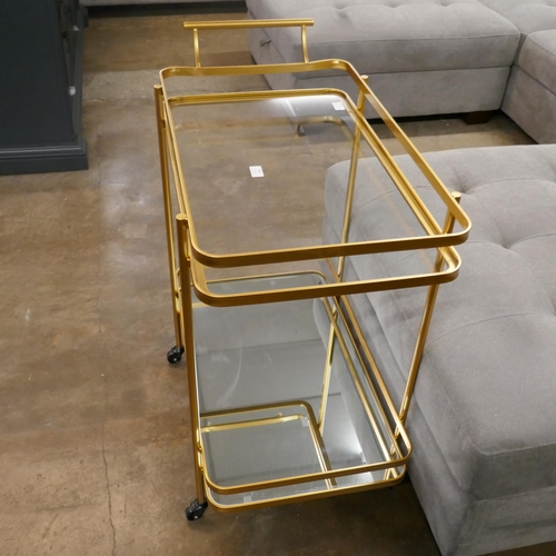 1358 - A gold mirrored drinks trolley