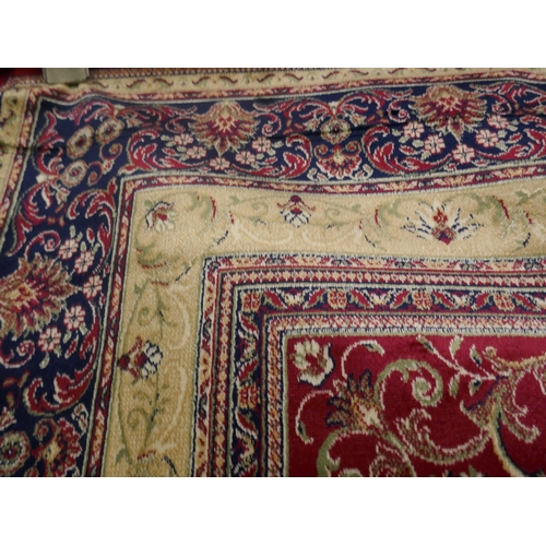 1360 - A red ground Keshan rug, 230 x 160