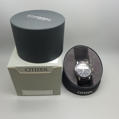 2101 - A men's Citizen Eco-Drive chronograph wristwatch with stainless steel case, black dials and black le... 