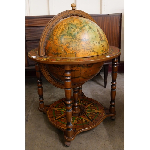 24 - An Italian terrestrial globe cocktail cabinet/trolley