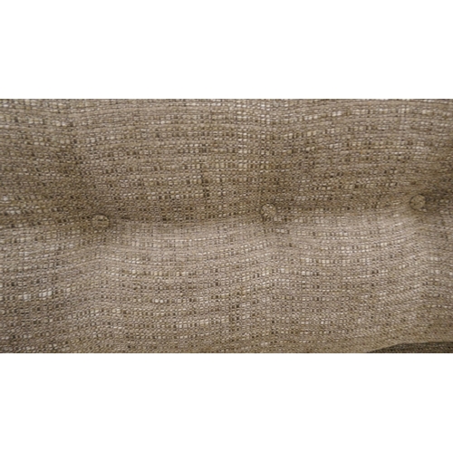 1451 - An oatmeal weave three seater sofa