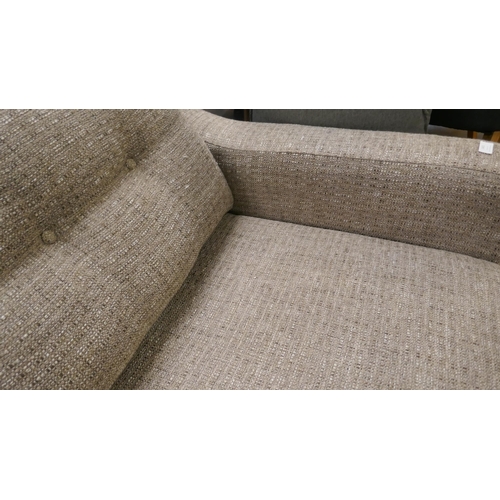 1451 - An oatmeal weave three seater sofa