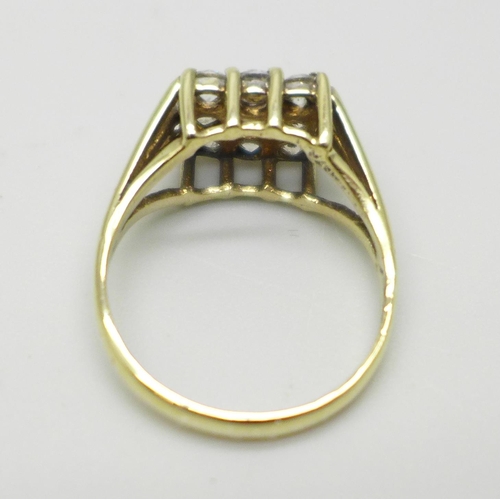 1004 - A 9ct gold and zircon ring, 2.9g, M