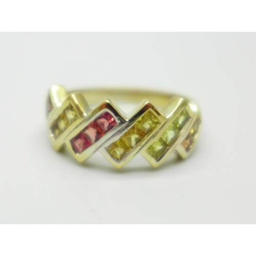 1005 - A silver gilt rainbow sapphire ring, N, (TGGC)