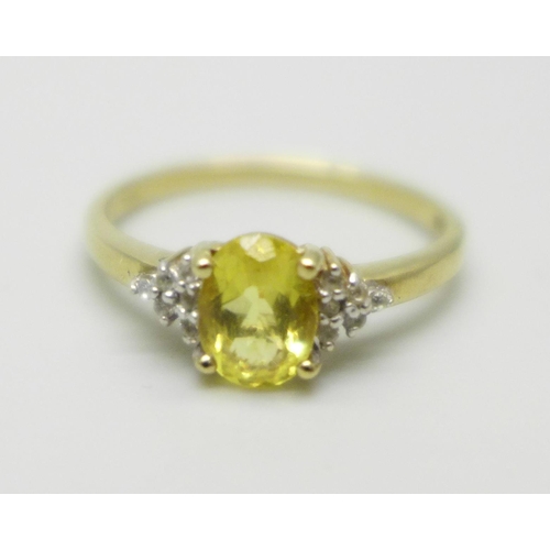 1007 - A 9ct gold, yellow stone and zircon ring, 1.6g, N/O