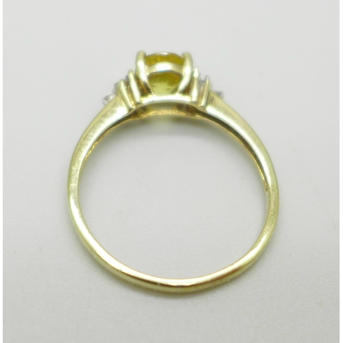 1007 - A 9ct gold, yellow stone and zircon ring, 1.6g, N/O