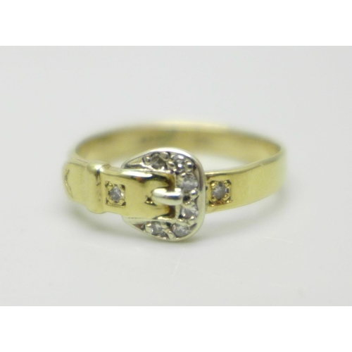 1008 - A 9ct gold buckle ring set with eight diamonds, 1.8g, M