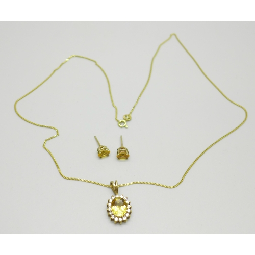 1011 - A 9ct gold, citrine and zircon pendant and chain with citrine earrings, 4.9g