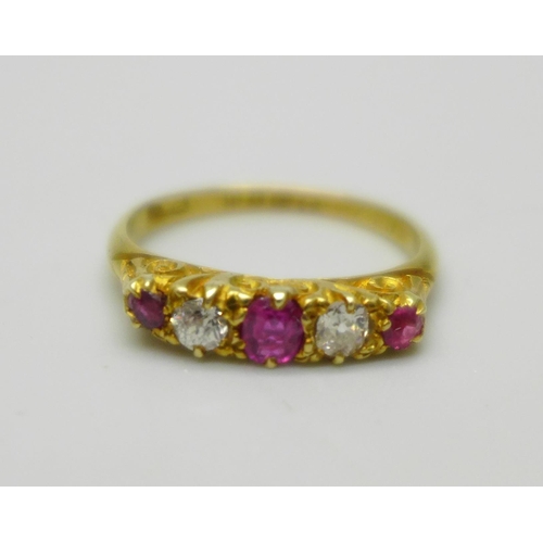 1015 - An antique 18ct gold, ruby and diamond ring, London 1915, 2.5g, K, one stone possibly replaced, in a... 