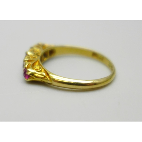 1015 - An antique 18ct gold, ruby and diamond ring, London 1915, 2.5g, K, one stone possibly replaced, in a... 