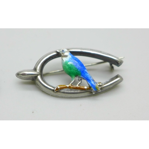 1018 - A silver and enamelled bird brooch, Birmingham 1916, a 925 silver stylised swan brooch and a silver ... 