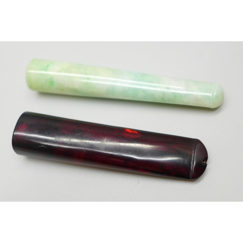 1034 - Two cigarette/pipe holders; one jadeite and one amber (a/f)