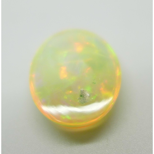 1039 - An unmounted opal, 2.6g (13cts)