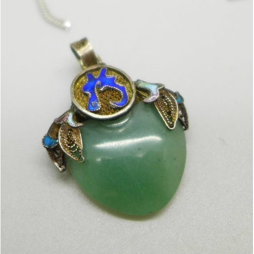 1040 - A fine 9ct gold necklace, 0.9g, with Chinese silver charm and a jade and silver gilt pendant