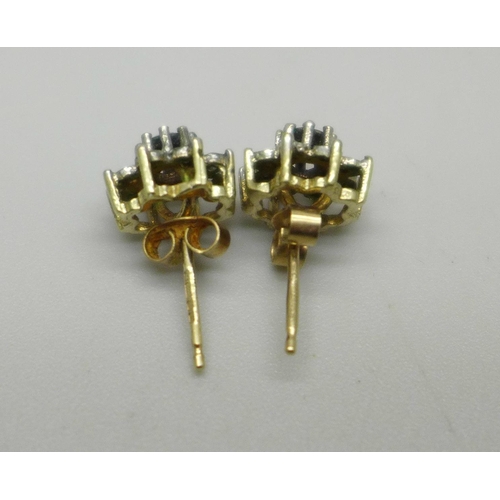 1048 - A pair of 9ct gold, sapphire and diamond ear studs, 1.5g