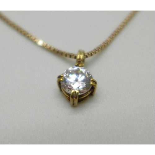 1049 - A yellow metal diamond simulant pendant on a 9ct gold chain, 2.1g, 41.5cm