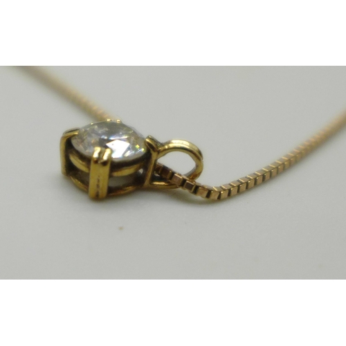 1049 - A yellow metal diamond simulant pendant on a 9ct gold chain, 2.1g, 41.5cm