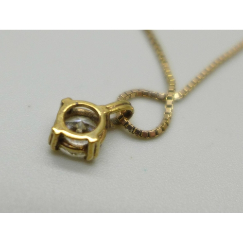 1049 - A yellow metal diamond simulant pendant on a 9ct gold chain, 2.1g, 41.5cm