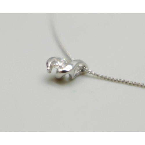 1050A - A 9ct white gold and diamond pendant on a fine 9ct white gold chain, 0.9g, chain 41cm, with Canadian... 