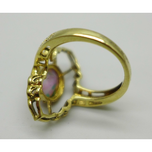 1053 - A silver gilt Ethiopian opal ring, O