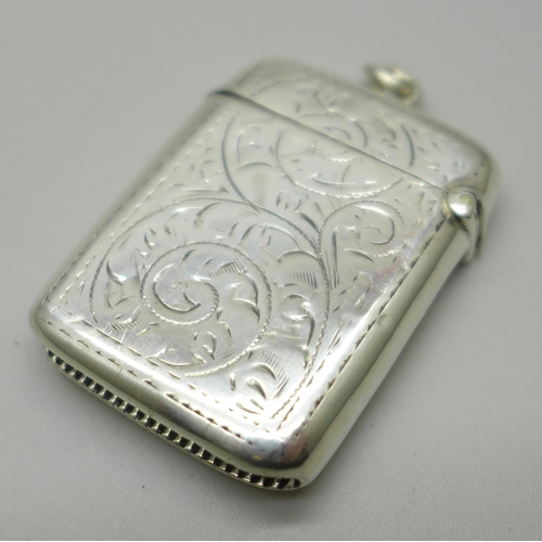 1055 - A silver vesta case, Birmingham 1910, 20g