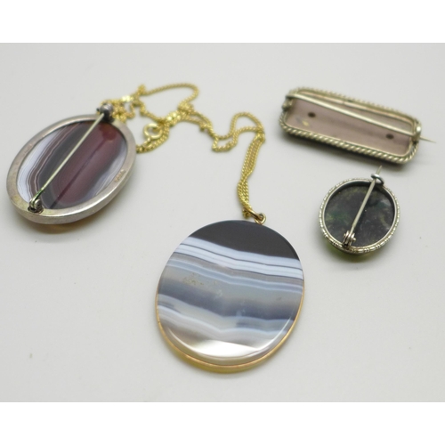 1065 - A gilt metal mounted agate pendant, a silver and agate brooch by Malcolm Gray, a moss agate brooch, ... 