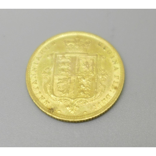 1086 - A Victorian 1884 shield back half sovereign