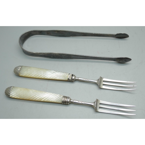 1120 - Two Georgian silver and mother of pearl handled fish forks and a pair Hester Bateman silver sugar bo... 