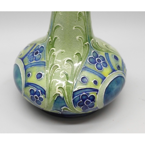 606 - An early William Moorcroft vase, made for Liberty & Co., rim a/f, 18cm
