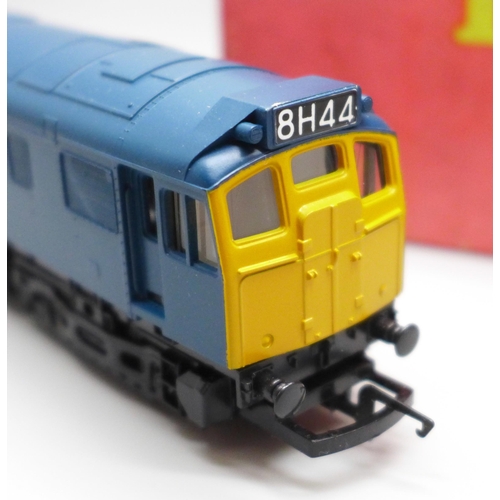 614 - A Hornby Railways 00 gauge BR Class 25 diesel in blue livery, boxed and a Tri-ang Railways OO gauge ... 