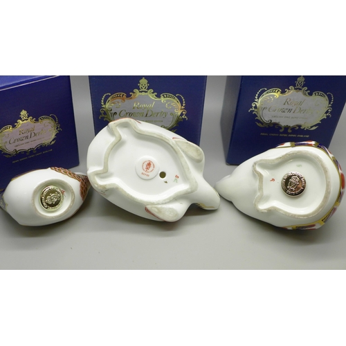 618 - Two Royal Crown Derby paperweights; wren and hedgehog, both with silver stoppers and tortoise with f... 