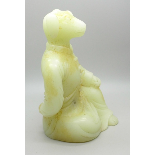 632 - A Chinese carved hardstone figure of a dog, 15cm