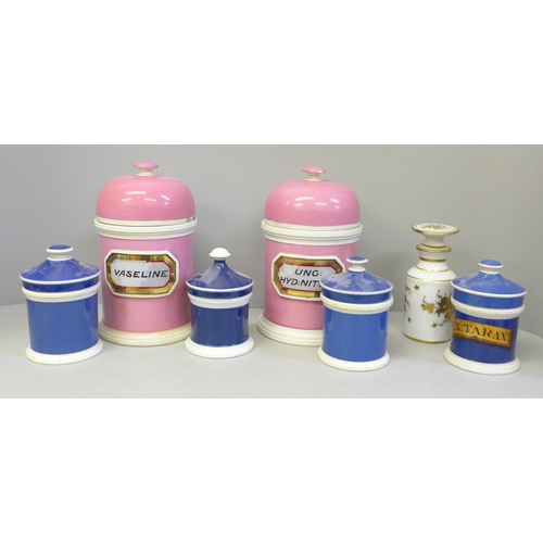 654 - A collection of ceramic apothecary jars, three named, three lids a/f