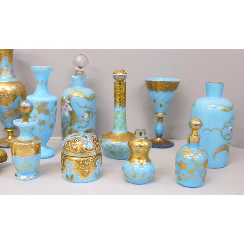 663 - French opaline sky blue glass and gilded scent bottles, vases, jug and pots, (21) (one scent bottle ... 