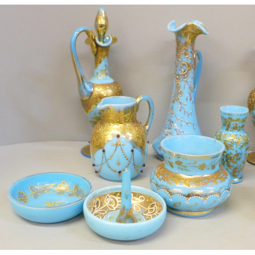 663 - French opaline sky blue glass and gilded scent bottles, vases, jug and pots, (21) (one scent bottle ... 