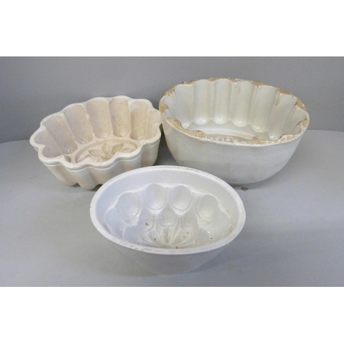 703 - A collection of Victorian salt glazed and other jelly moulds (13) **PLEASE NOTE THIS LOT IS NOT ELIG... 