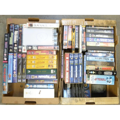 709 - Vintage VHS tapes including Cert. 18, Rambo, Blade Runner, Indiana Jones, etc., and a box of Space a... 