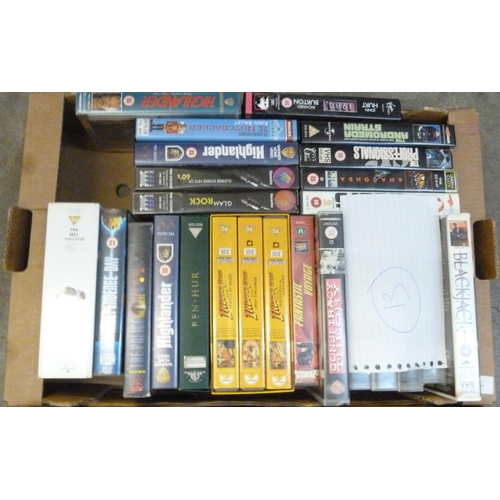 709 - Vintage VHS tapes including Cert. 18, Rambo, Blade Runner, Indiana Jones, etc., and a box of Space a... 