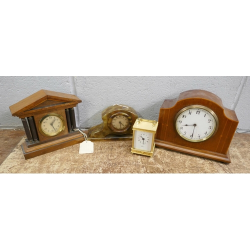 720 - An Edwardian inlaid clock, brass carriage  timepiece and two other clocks