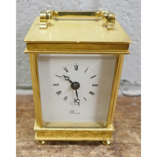 720 - An Edwardian inlaid clock, brass carriage  timepiece and two other clocks