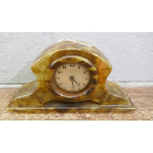 720 - An Edwardian inlaid clock, brass carriage  timepiece and two other clocks